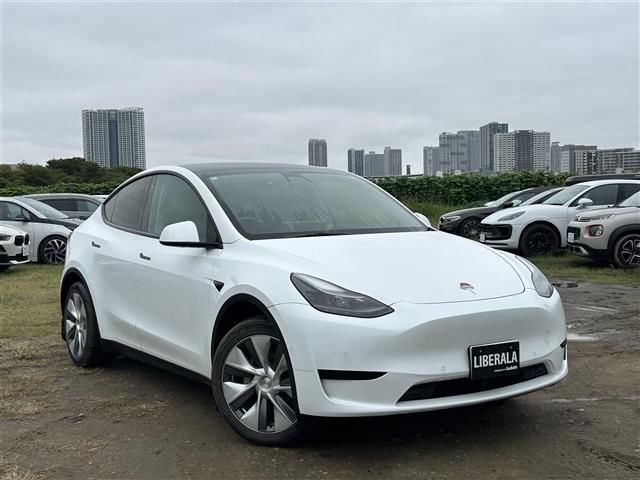 2022 Tesla Model Y RWD - photo 1 2022 Tesla Model Y RWD SUV for sale, Japanese used car export - photo 1 of 12 | GULJI TRADERS
