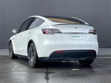 2023 Tesla Model Y 4WD SUV for sale, Japanese used car export - photo 2 of 24 | GULJI TRADERS