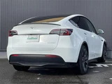 2023 Tesla Model Y 4WD SUV for sale, Japanese used car export - photo 24 of 24 | GULJI TRADERS