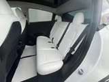 2024 Tesla Model Y RWD SUV for sale, Japanese used car export - photo 47 of 77 | GULJI TRADERS