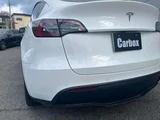 2024 Tesla Model Y RWD SUV for sale, Japanese used car export - photo 75 of 77 | GULJI TRADERS