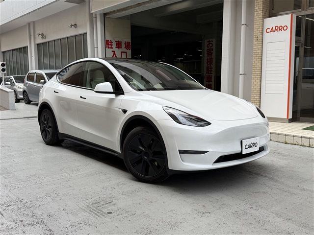 2024 Tesla Model Y Long - photo 1 2024 Tesla Model Y Long SUV for sale, Japanese used car export - photo 1 of 30 | GULJI TRADERS