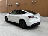 2024 Tesla Model Y Long SUV for sale, Japanese used car export - photo 8 of 30 | GULJI TRADERS