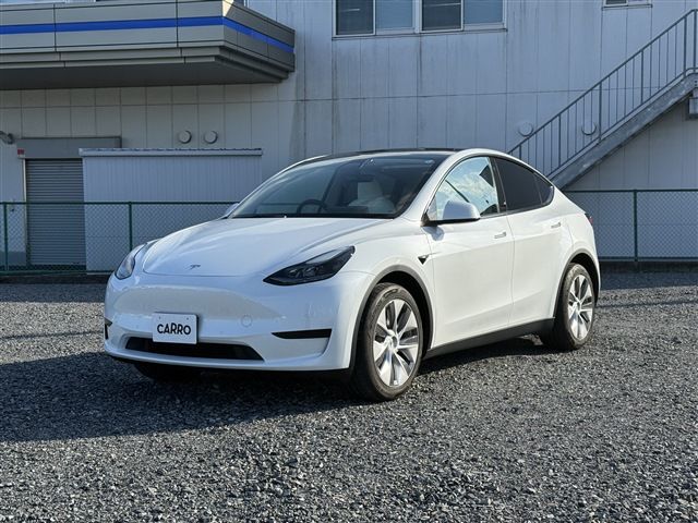 2024 Tesla Model Y RWD - photo 1 2024 Tesla Model Y RWD SUV for sale, Japanese used car export - photo 1 of 30 | GULJI TRADERS