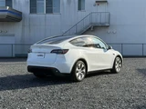2024 Tesla Model Y RWD SUV for sale, Japanese used car export - photo 13 of 30 | GULJI TRADERS