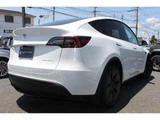 2024 Tesla Model Y Long SUV for sale, Japanese used car export - photo 8 of 9 | GULJI TRADERS