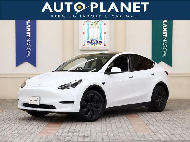 2024 Tesla Model Y RWD - photo 1 2024 Tesla Model Y RWD SUV for sale, Japanese used car export - photo 1 of 9 | GULJI TRADERS