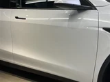 2025 Tesla Model Y Long 4WD SUV for sale, Japanese used car export - photo 15 of 24 | GULJI TRADERS
