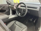 2025 Tesla Model Y Long 4WD SUV for sale, Japanese used car export - photo 21 of 24 | GULJI TRADERS