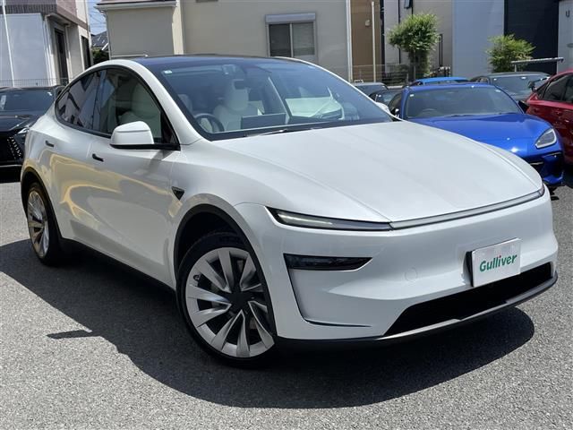 2025 Tesla Model Y Long 4WD - photo 1 2025 Tesla Model Y Long 4WD SUV for sale, Japanese used car export - photo 1 of 23 | GULJI TRADERS