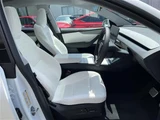 2025 Tesla Model Y Long 4WD SUV for sale, Japanese used car export - photo 12 of 23 | GULJI TRADERS