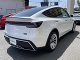 2025 Tesla Model Y Long 4WD SUV for sale, Japanese used car export - photo 15 of 23 | GULJI TRADERS