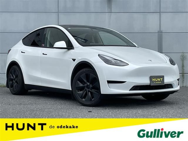 2025 Tesla Model Y RWD - photo 1 2025 Tesla Model Y RWD SUV for sale, Japanese used car export - photo 1 of 24 | GULJI TRADERS
