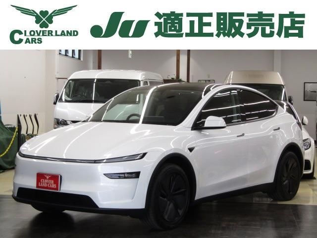 2025 Tesla Model Y RWD - photo 1 2025 Tesla Model Y RWD SUV for sale, Japanese used car export - photo 1 of 2 | GULJI TRADERS