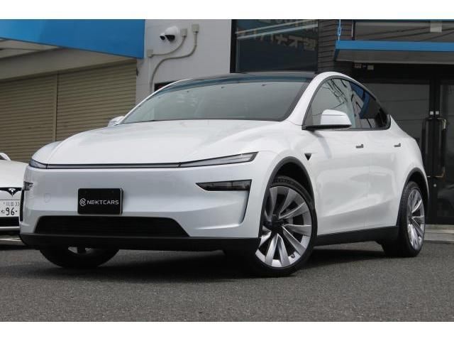 2025 Tesla Model Y Long - photo 1 2025 Tesla Model Y Long SUV for sale, Japanese used car export - photo 1 of 9 | GULJI TRADERS