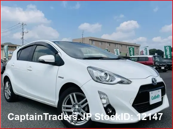 2015 Toyota Aqua - photo 1 2015 Toyota Aqua White Sedan for sale, Japanese used car export | GULJI TRADERS