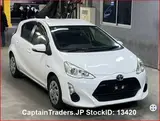 2017 Toyota Aqua White Sedan for sale, Japanese used car export - photo 1 of 23 | GULJI TRADERS