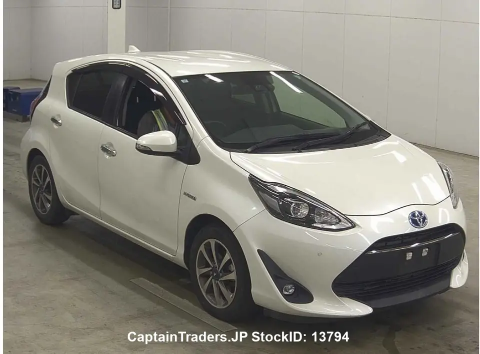 2019 Toyota Aqua - photo 1 2019 Toyota Aqua Pearl Sedan for sale, Japanese used car export - photo 1 of 28 | GULJI TRADERS