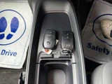 2024 Toyota Aqua 1.5 X E-Four 4WD Sedan for sale, Japanese used car export - photo 33 of 49 | GULJI TRADERS