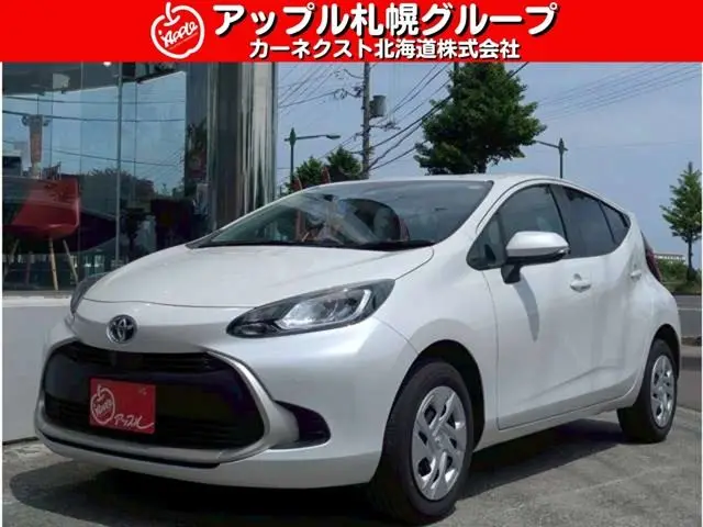 2025 Toyota Aqua 1.5 G E-Four 4WD Pearl Sedan for sale, Japanese used car export | GULJI TRADERS