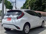 2025 Toyota Aqua 1.5 G E-Four 4WD Pearl Sedan for sale, Japanese used car export - photo 15 of 41 | GULJI TRADERS