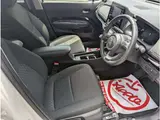 2025 Toyota Aqua 1.5 G E-Four 4WD Pearl Sedan for sale, Japanese used car export - photo 28 of 41 | GULJI TRADERS