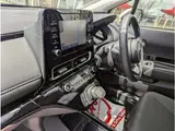 2025 Toyota Aqua 1.5 G E-Four 4WD Pearl Sedan for sale, Japanese used car export - photo 32 of 41 | GULJI TRADERS