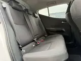 2025 Toyota Aqua 1.5 G E-Four 4WD White Sedan for sale, Japanese used car export - photo 12 of 53 | GULJI TRADERS
