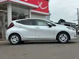 2025 Toyota Aqua 1.5 G E-Four 4WD White Sedan for sale, Japanese used car export - photo 16 of 53 | GULJI TRADERS