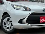 2025 Toyota Aqua 1.5 G E-Four 4WD White Sedan for sale, Japanese used car export - photo 22 of 53 | GULJI TRADERS