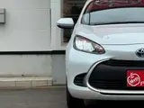 2025 Toyota Aqua 1.5 G E-Four 4WD White Sedan for sale, Japanese used car export - photo 24 of 53 | GULJI TRADERS