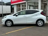 2025 Toyota Aqua 1.5 G E-Four 4WD White Sedan for sale, Japanese used car export - photo 27 of 53 | GULJI TRADERS