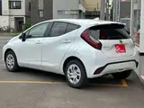 2025 Toyota Aqua 1.5 G E-Four 4WD White Sedan for sale, Japanese used car export - photo 28 of 53 | GULJI TRADERS