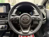 2025 Toyota Aqua 1.5 G E-Four 4WD White Sedan for sale, Japanese used car export - photo 31 of 53 | GULJI TRADERS