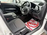 2025 Toyota Aqua 1.5 G E-Four 4WD White Sedan for sale, Japanese used car export - photo 47 of 53 | GULJI TRADERS