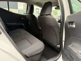 2025 Toyota Aqua 1.5 G E-Four 4WD White Sedan for sale, Japanese used car export - photo 48 of 53 | GULJI TRADERS