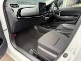 2025 Toyota Aqua 1.5 G E-Four 4WD White Sedan for sale, Japanese used car export - photo 49 of 53 | GULJI TRADERS