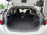 2025 Toyota Aqua 1.5 G E-Four 4WD White Sedan for sale, Japanese used car export - photo 53 of 53 | GULJI TRADERS