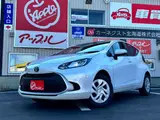 2025 Toyota Aqua 1.5 G E-Four 4WD White Sedan for sale, Japanese used car export - photo 1 of 41 | GULJI TRADERS