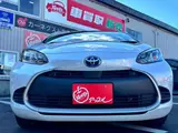 2025 Toyota Aqua 1.5 G E-Four 4WD White Sedan for sale, Japanese used car export - photo 2 of 41 | GULJI TRADERS