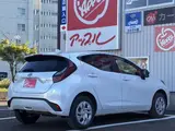 2025 Toyota Aqua 1.5 G E-Four 4WD White Sedan for sale, Japanese used car export - photo 6 of 41 | GULJI TRADERS