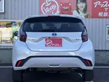 2025 Toyota Aqua 1.5 G E-Four 4WD White Sedan for sale, Japanese used car export - photo 7 of 41 | GULJI TRADERS