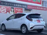 2025 Toyota Aqua 1.5 G E-Four 4WD White Sedan for sale, Japanese used car export - photo 8 of 41 | GULJI TRADERS