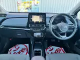 2025 Toyota Aqua 1.5 G E-Four 4WD White Sedan for sale, Japanese used car export - photo 10 of 41 | GULJI TRADERS