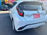 2025 Toyota Aqua 1.5 G E-Four 4WD White Sedan for sale, Japanese used car export - photo 27 of 41 | GULJI TRADERS