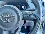 2025 Toyota Aqua 1.5 G E-Four 4WD White Sedan for sale, Japanese used car export - photo 31 of 41 | GULJI TRADERS