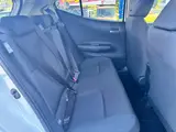 2025 Toyota Aqua 1.5 G E-Four 4WD White Sedan for sale, Japanese used car export - photo 39 of 41 | GULJI TRADERS