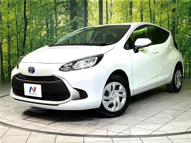 2025 Toyota Aqua G - photo 1 2025 Toyota Aqua G Pearl Sedan for sale, Japanese used car export - photo 1 of 30 | GULJI TRADERS