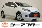 2025 Toyota Aqua 1.5 G 4WD White Sedan for sale, Japanese used car export - photo 1 of 30 | GULJI TRADERS