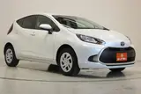 2025 Toyota Aqua 1.5 G 4WD White Sedan for sale, Japanese used car export - photo 6 of 30 | GULJI TRADERS